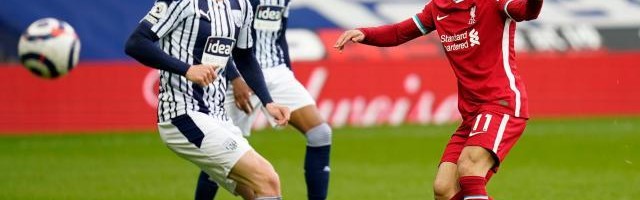 开云体育-天降神兵阿利松！把进球献给父亲 他助红军紧追前4